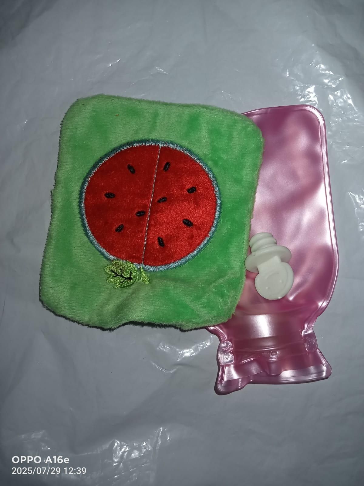 Small Hot Water Rubber Bottle with green soft cover and watermelon design for pain relief therapy