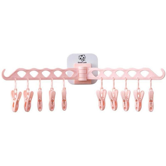 Pink multifunction clothing hanger with clip stand and multiple hanging clips for drying clothes